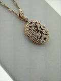 Diamond accented millgrain locket.